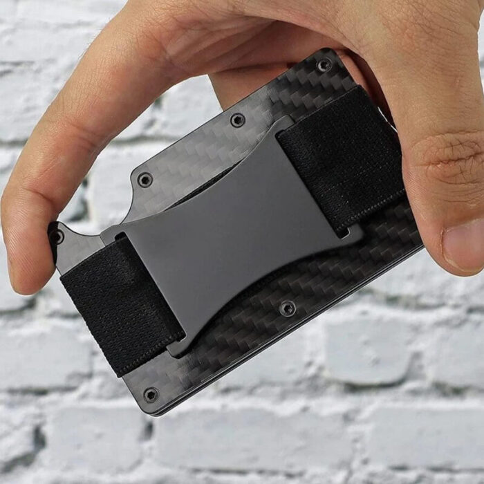 minimalist carbon credit card holder handling visual